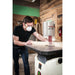 Person using a JET JOSS-S Oscillating Spindle Sander in a workshop