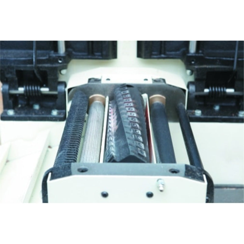 Close-up of a mechanical component with gears and bearings on a JET JPT_310HH-M Helical Planer Thicknesser