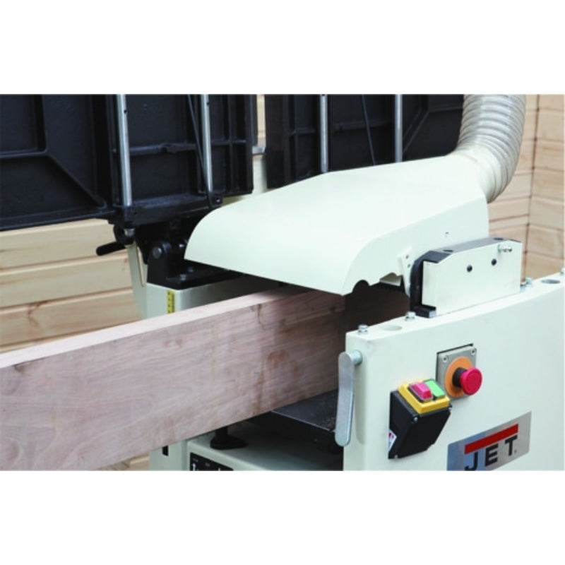 JET JPT_410HH-T Helical Planer Thicknesses with a piece of wood being processed